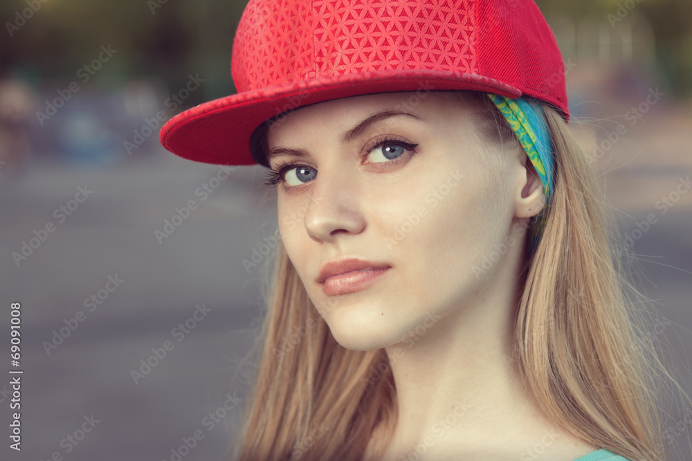 Closeup of young girl face in cap Closeup of young girl face in cap
