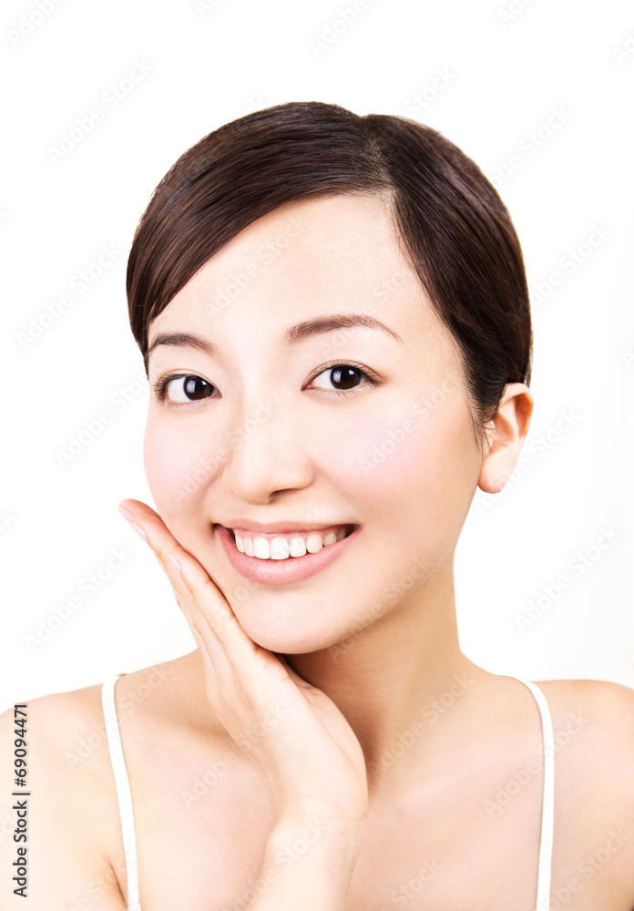 Cute asian girl smiling with teeth.touching her face.isolated. Cute asian girl smiling with teeth.touching her face.isolated.