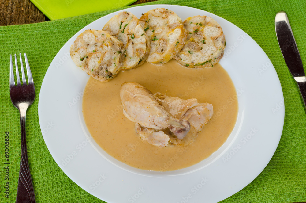 Chicken in cream sauce with dumplings