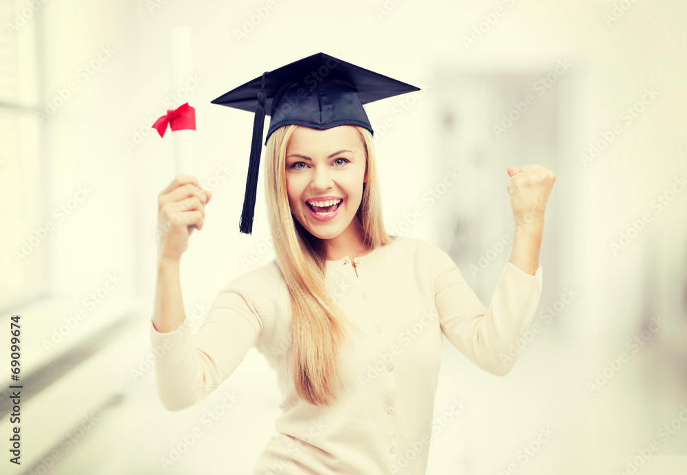 student in graduation cap with certificate student in graduation cap with certificate