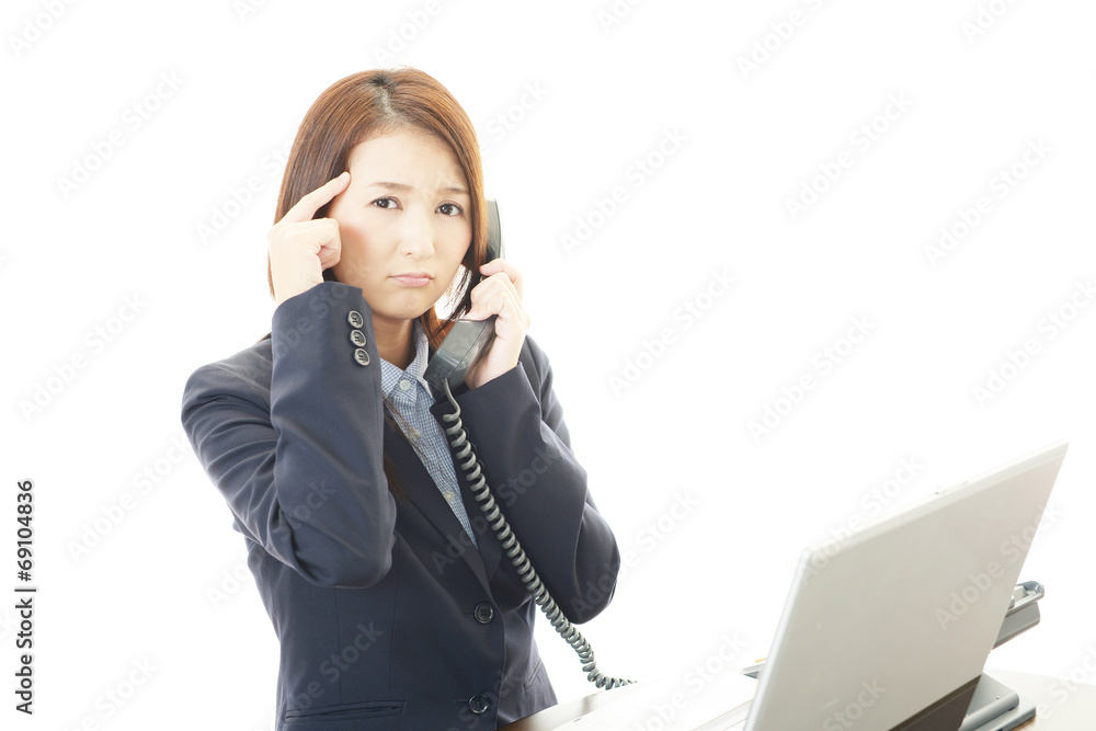 困惑した表情のOL 困惑した表情のOL