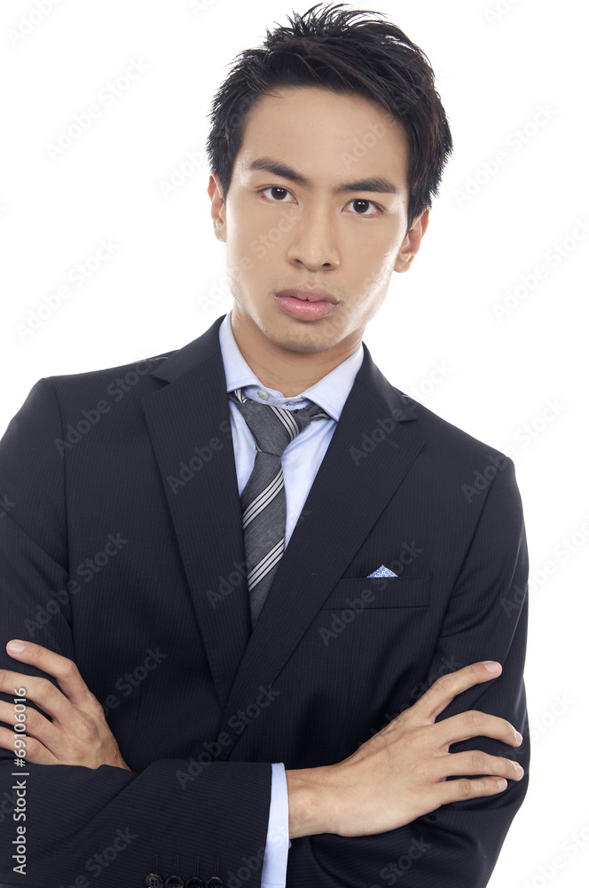 Friendly and smiling businessman looking at camera Friendly and smiling businessman looking at camera
