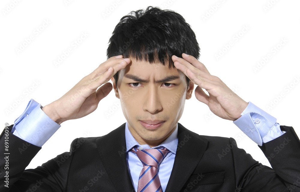 Close up Young business man having stress or a headache Close up Young business man having stress or a headache