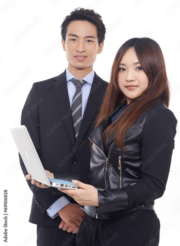 Business couple with laptop isolated on white background Business couple with laptop isolated on white background