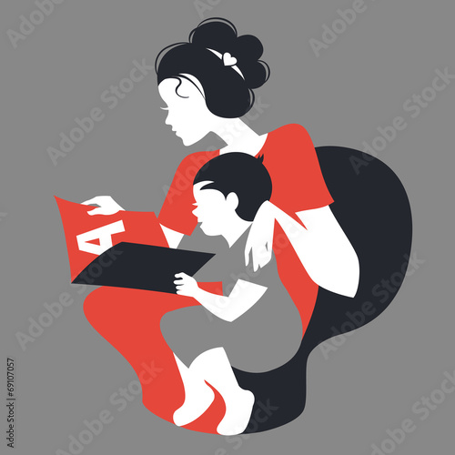 Beautiful silhouette  of mother and baby reading book.