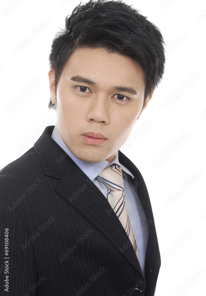 Portrait of businessman standing comfortably. Portrait of businessman standing comfortably.