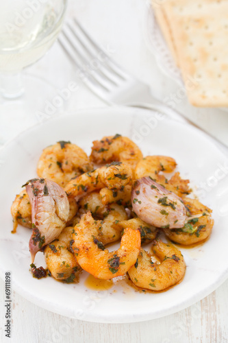 fried shrimps with garlic on plate