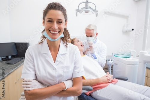 Dental assistant smiling at camera