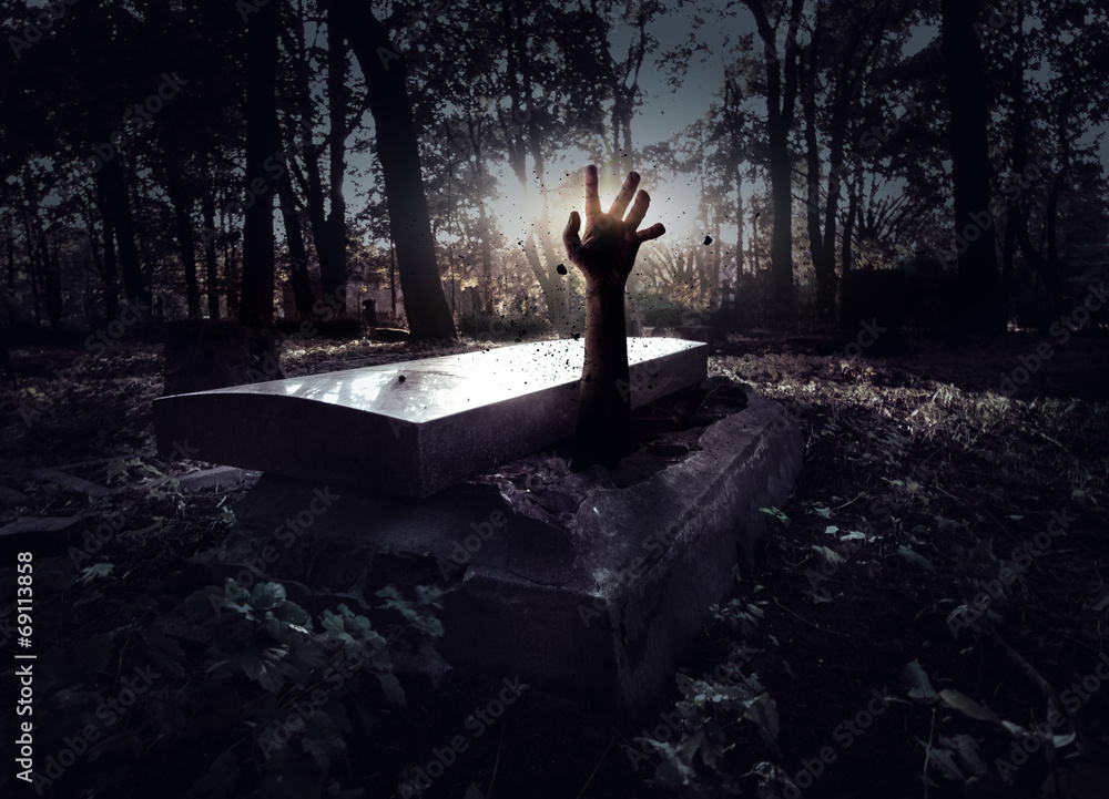 Naklejka premium Hand rising out from the grave