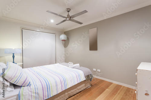 Bedroom with wooden floors