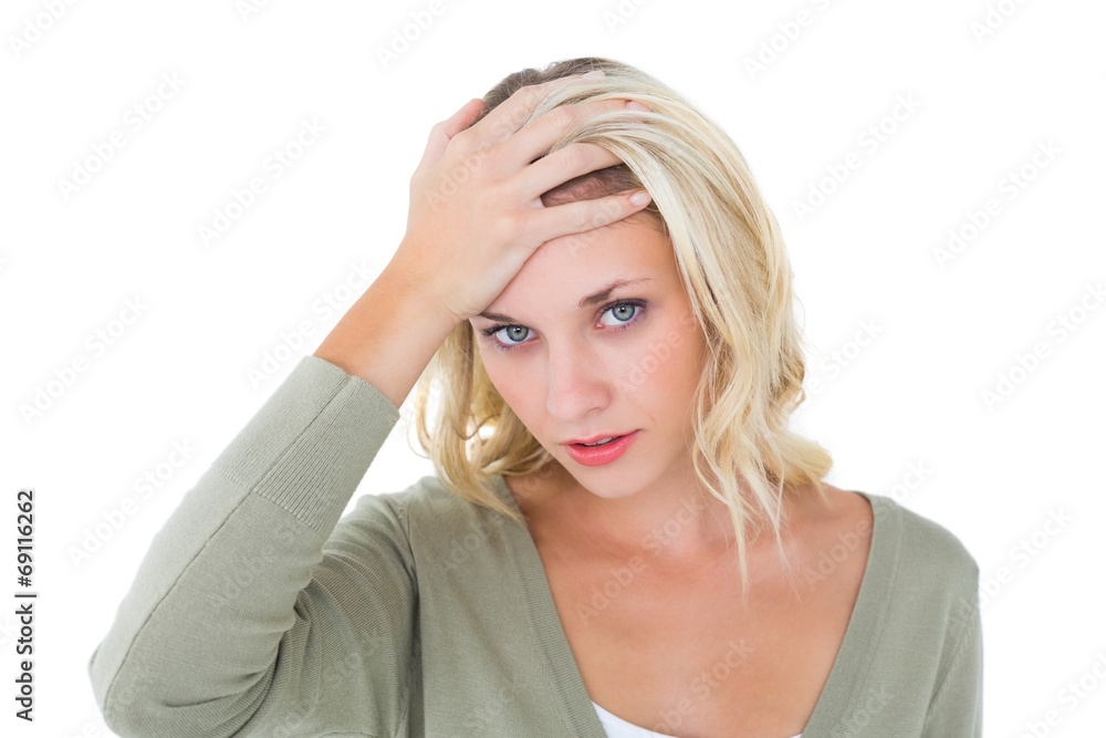 Fototapeta premium Confused young blonde looking at camera