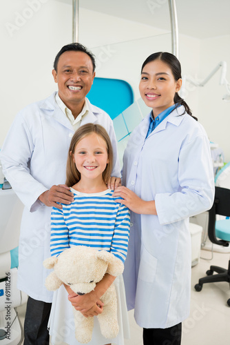 Dental team and patient