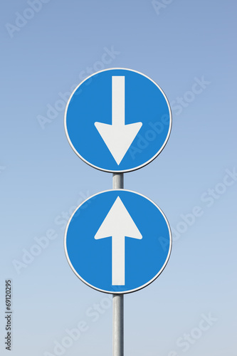 Obraz na plátně Road signs that point out a contradiction - concept image