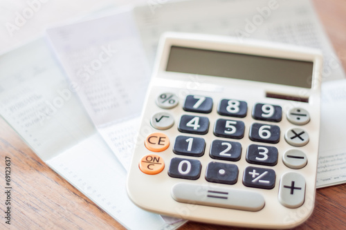 Calculator and bank account passbook © punsayaporn