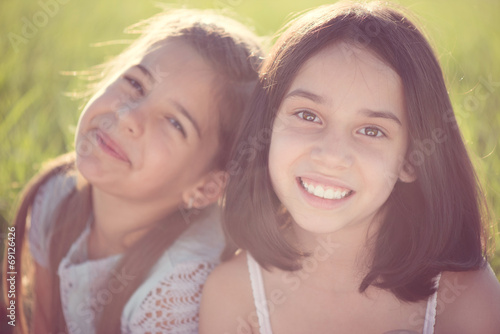 Portrait of two hispanic teen girls