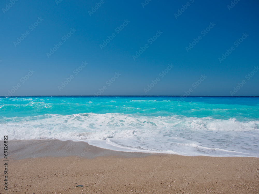 wild beach with rocks in water. Island Lefkada, Greece