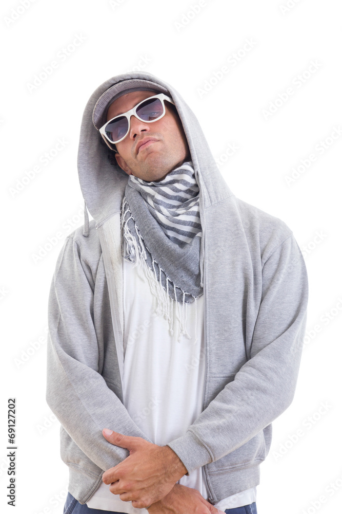 handsome fashion man in track suit standing cool with hood and s handsome fashion man in track suit standing cool with hood and s