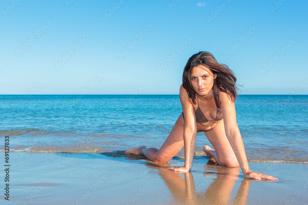 woman in bikini, outdoor on the beach
