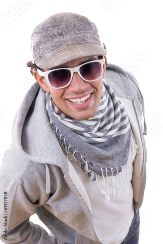 sexy man smiling in sweatshirt with sunglasses wearing cap and s © feelphotoartzm