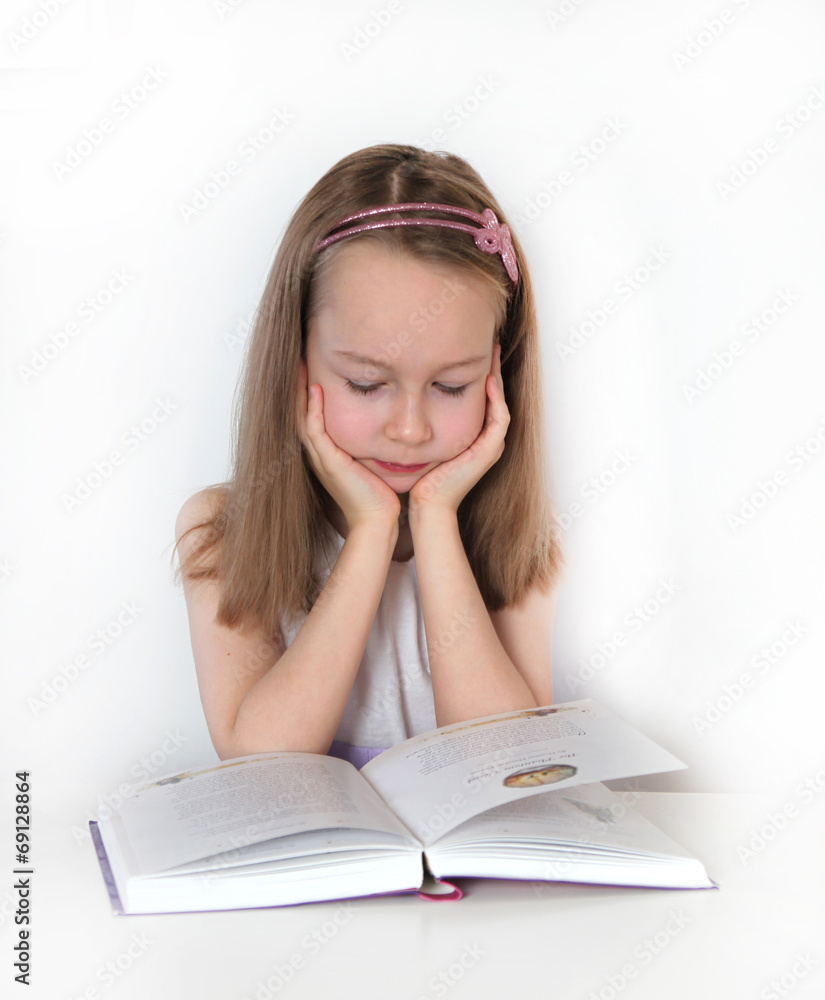 Girl reading the book. education and school concept Girl reading the book. education and school concept