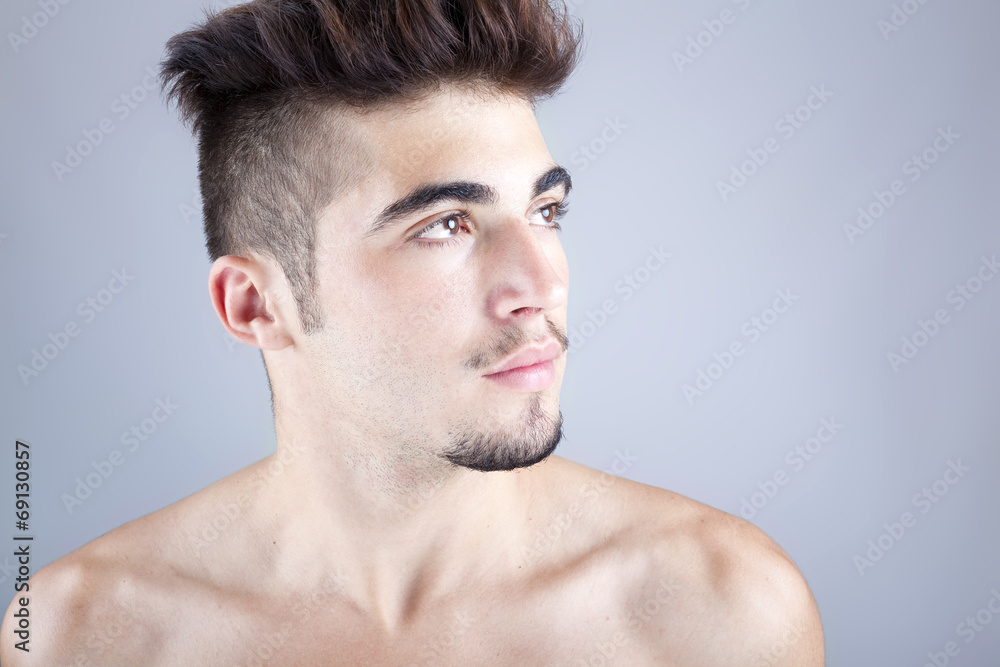Fototapeta premium Portrait of a handsome man, studio fashion portrait