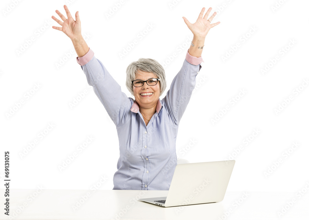 Ellderly woman working with a laptop Ellderly woman working with a laptop