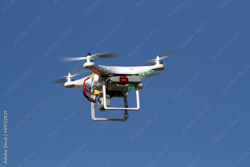 Drone - UAV - flying in the sky Drone - UAV - flying in the sky