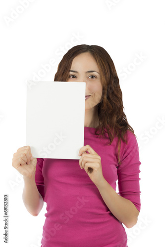Woman holding a billboard with copyspace for advertising