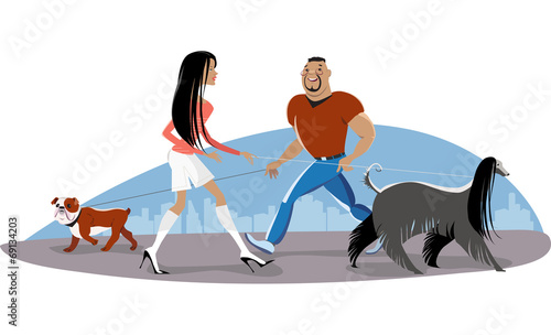 Couple walking dogs