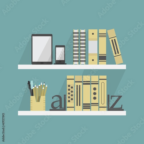 Close up of shelves with some books and accessories
