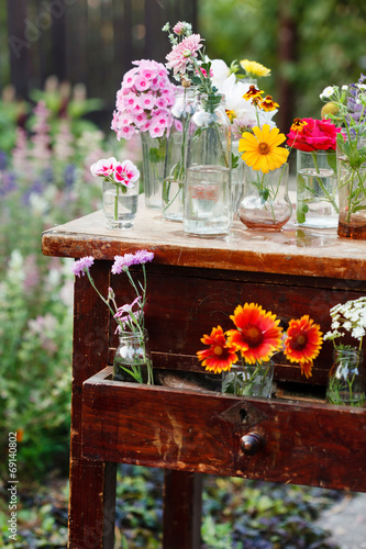 Fototapeta Naklejka Na Ścianę i Meble -  nice flowers in the bottles