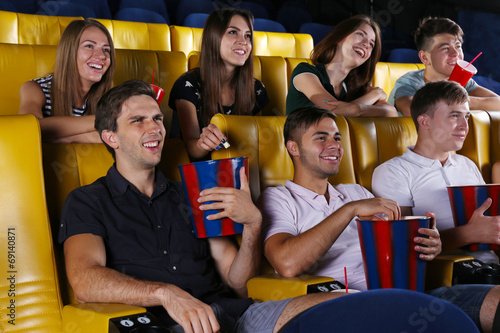 Young people watching movie...