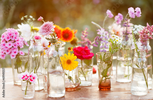 Fototapeta Naklejka Na Ścianę i Meble -  nice flowers in the bottles