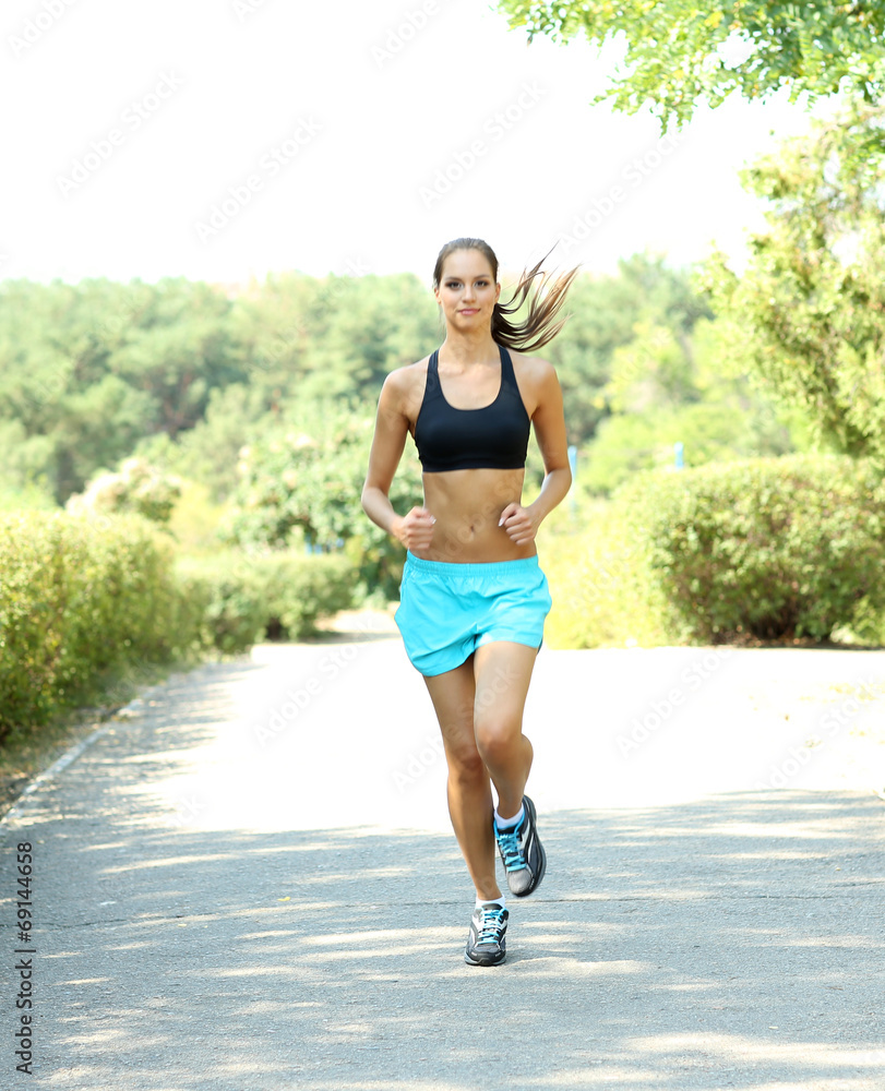 Young woman jogging at park