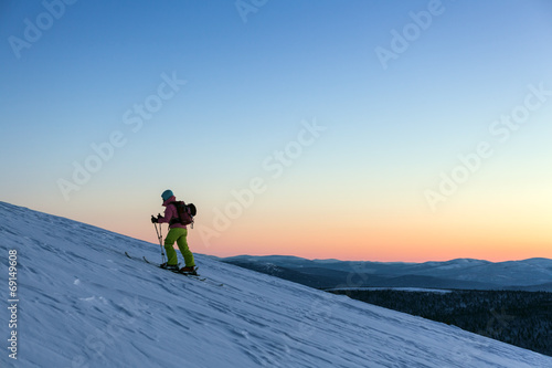 Skier go up mountain