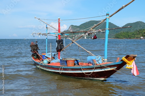 fishing boat on the beach © aukarawatcyber