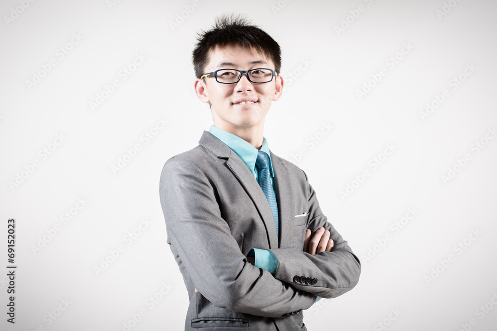 Successful young business man of Asian, full length portrait iso Successful young business man of Asian, full length portrait iso