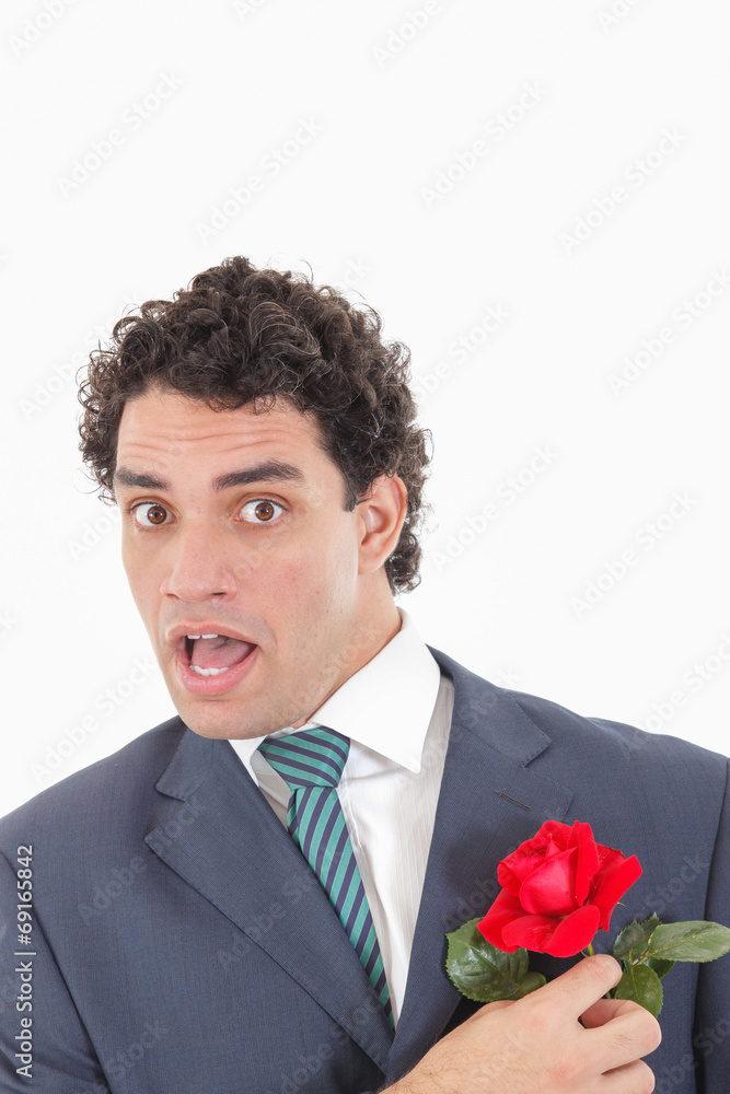 man with face expression holding with his hand rose man with face expression holding with his hand rose