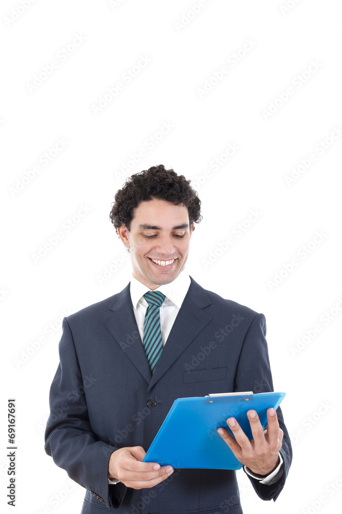 satisfied and smiling businessman in suit looking at company res satisfied and smiling businessman in suit looking at company res
