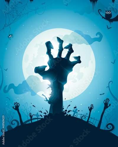 Halloween background with zombie hands on full moon