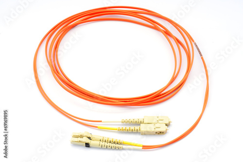 Close up of a fiber optic patchcord  over white background