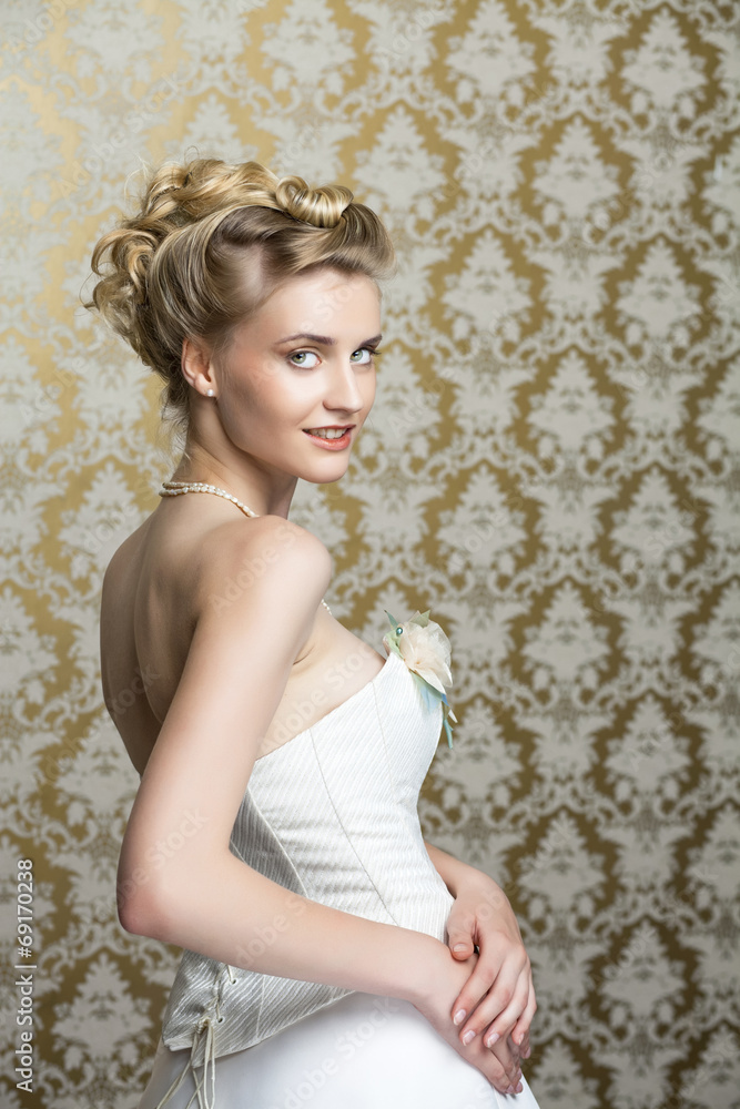 Young bride with beautiful wedding hairstyle