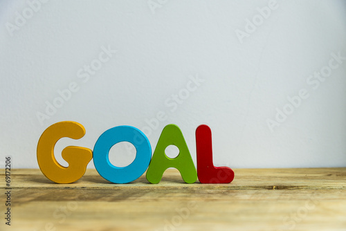 Colorful wooden word Goal with white background7 photo