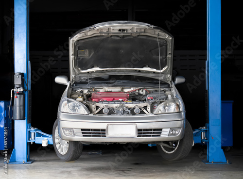 Car elevated in garage