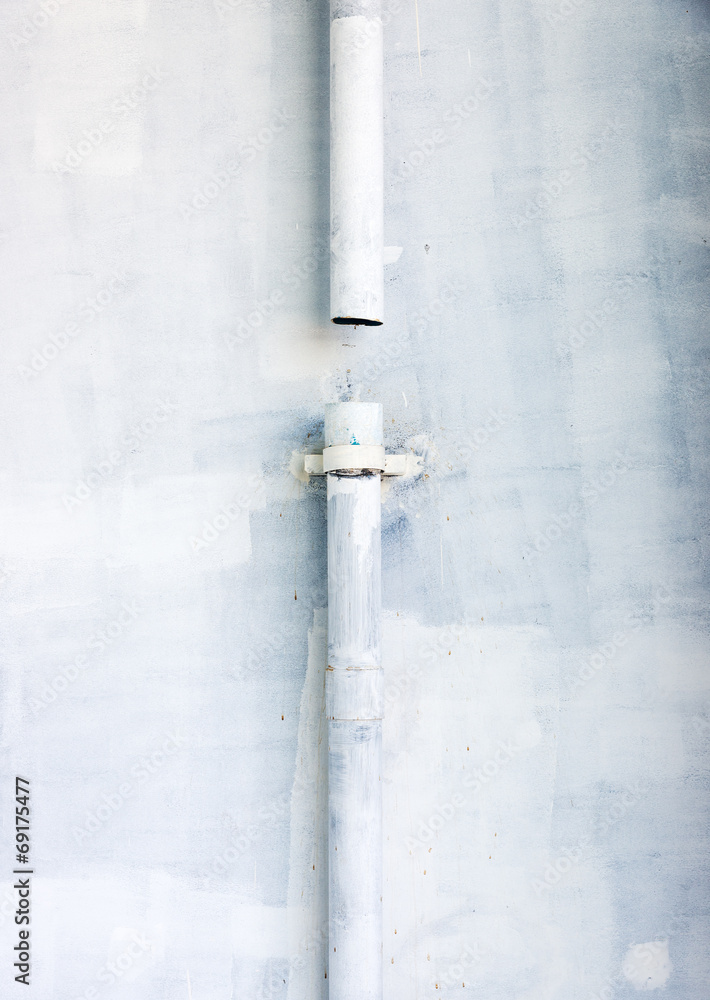 Incomplete pipe system on the factory wall. Incomplete pipe system on the factory wall.