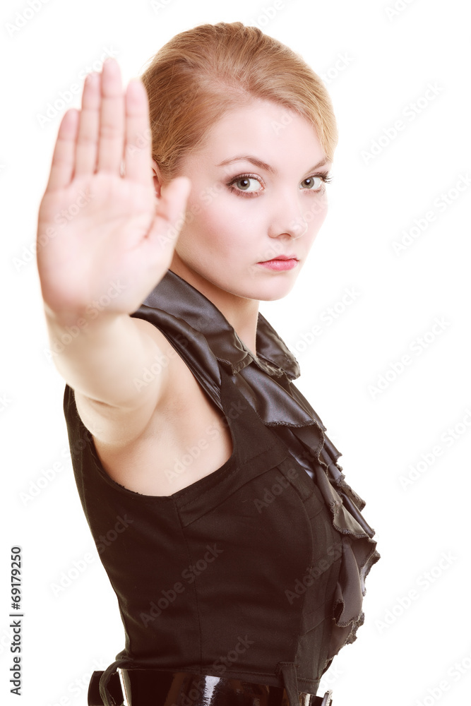Businesswoman showing stop hand sign gesture Businesswoman showing stop hand sign gesture