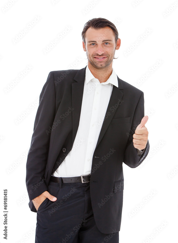 young smiling business man showing thumbs up young smiling business man showing thumbs up