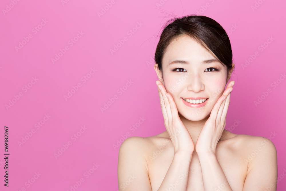 attractive asian woman on pink background attractive asian woman on pink background