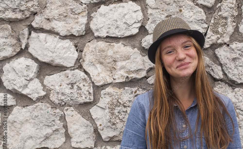Portrait of cute funny young girl wearing a hat. Portrait of cute funny young girl wearing a hat.
