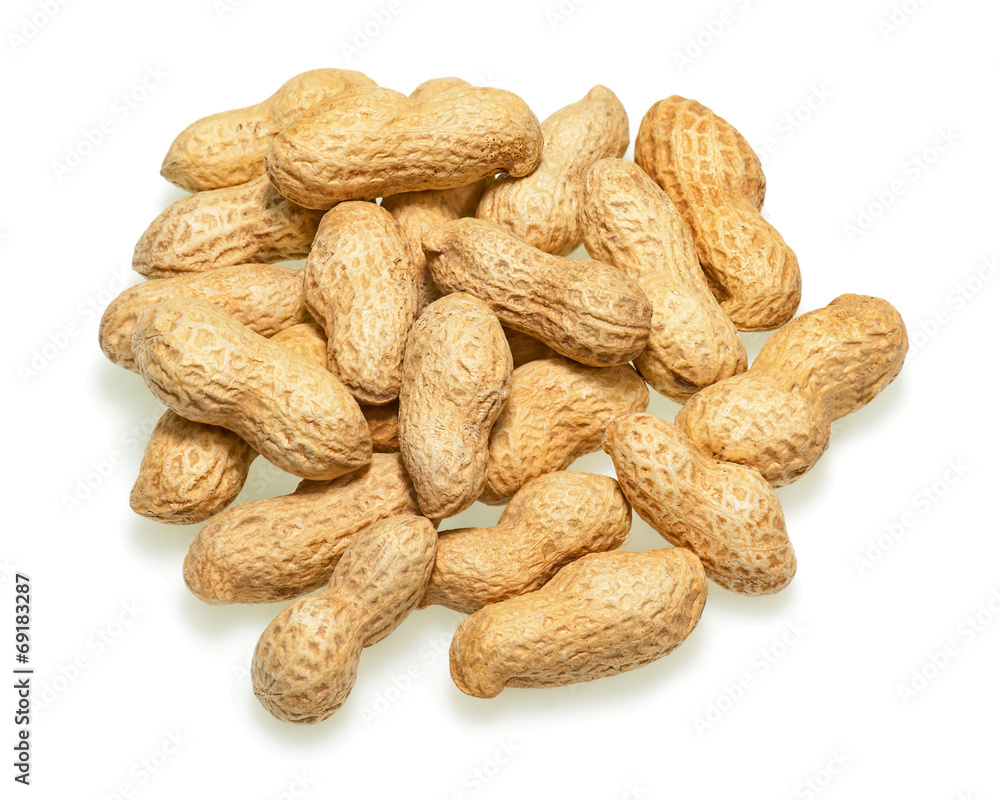 Pile of dry roasted peanuts isolated on white background. Pile of dry roasted peanuts isolated on white background.